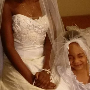 Ivory wedding dress.